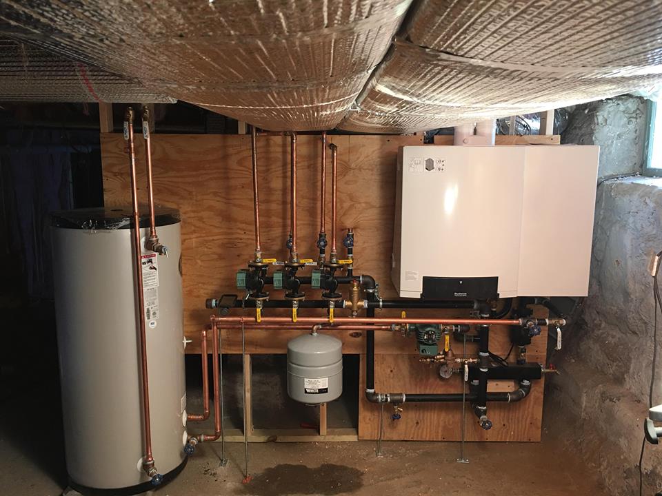 https://tkmechmass.com/wp-content/uploads/2023/05/Buderus-wall-hung-boiler-with-indirect-hot-water-heater-1.jpg